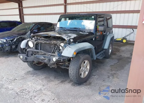 2011 Jeep Wrangler Sport z USA, uszkodzony, nr VIN 1J4AA2D17BL617455